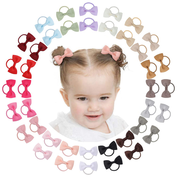 Jollybows 2-inch dark-set baby bows add color to outfits without pulling hair.