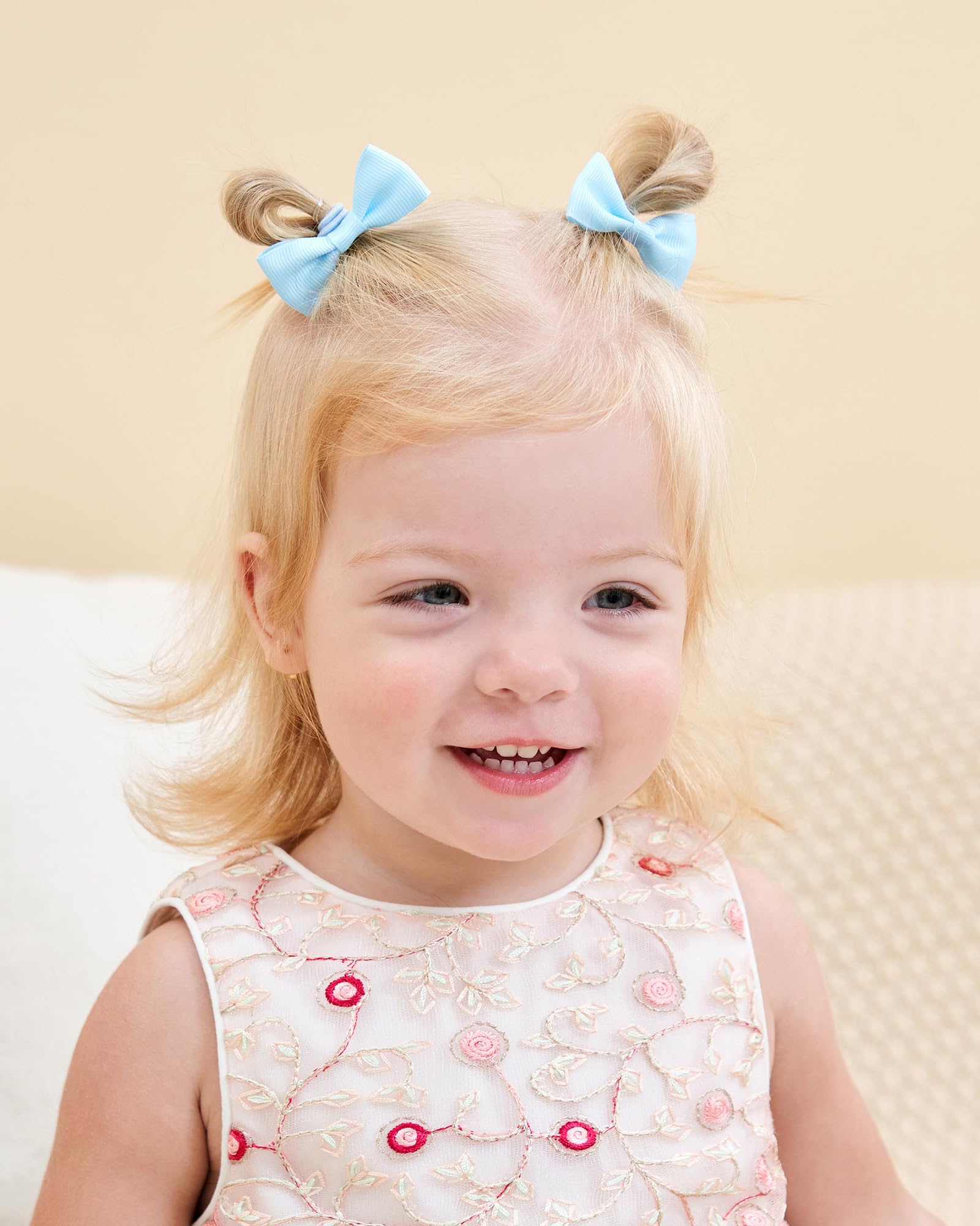 Jollybows mini 2-inch bows worn in ponytails for kids
