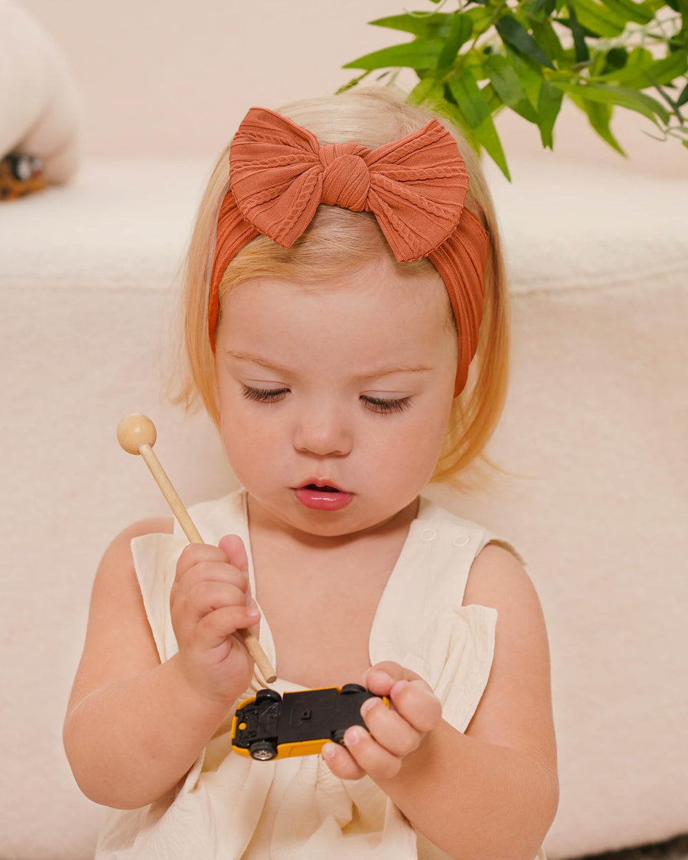 Jollybows headband for weddings and parties adds charm.