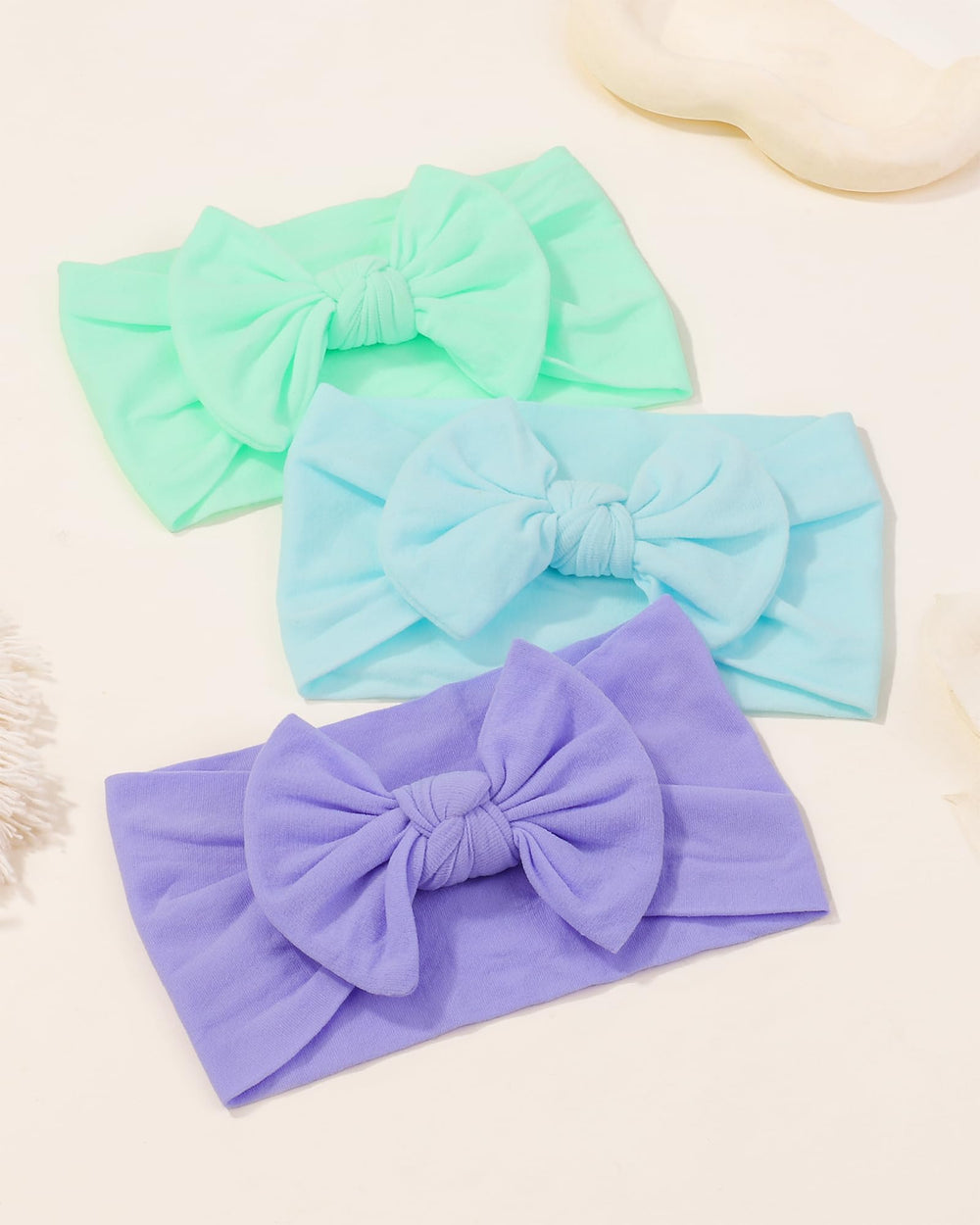 Jollybows 9-pack headbands ship neatly for easy storage.