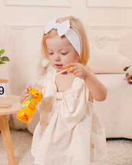 Jollybows pink heart pattern headband adds cute flair for photos and outings.