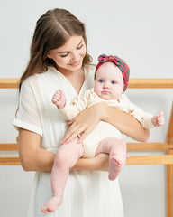 Jollybows pink nylon headband with gentle elasticity for everyday wear.