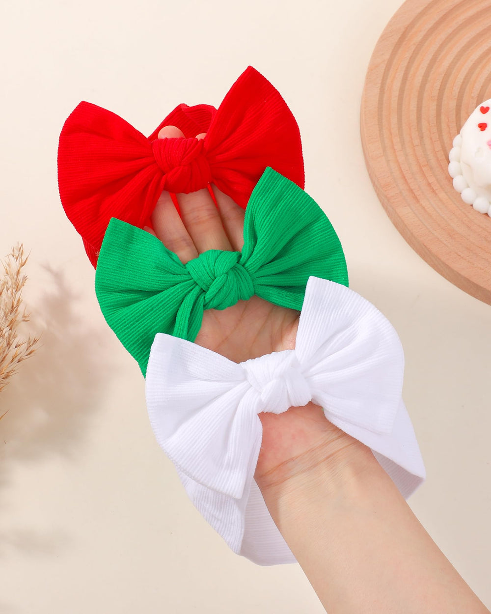 Jollybows stretch-fit headband demonstrates adjustable sizing for growing infants