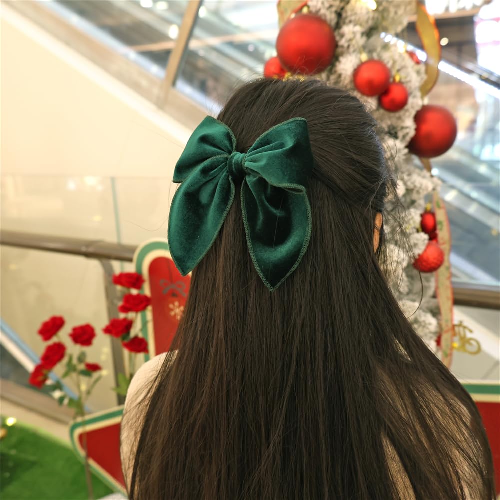 Jomila Christmas tree and gifts adorned with velvet bows for decor