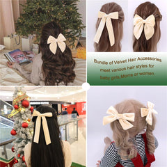 Jomila fable velvet bow clip adds a bold focal point for party looks