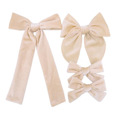 Jomila long-tail velvet bow clip enhances daily hairstyles with secure grip