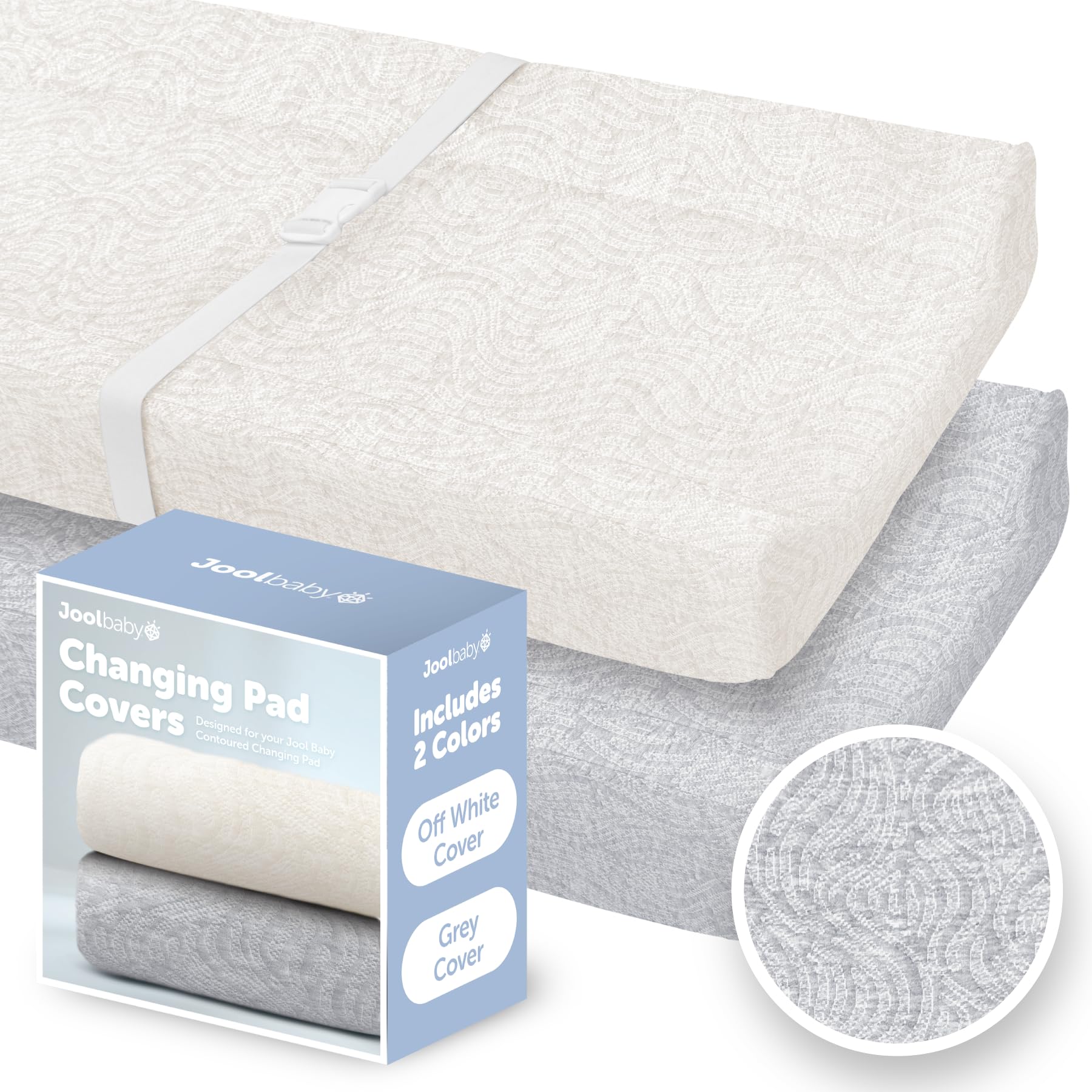 Jool Baby changing pad cover in off-white close-up showing soft fabric for gentle diaper changes.