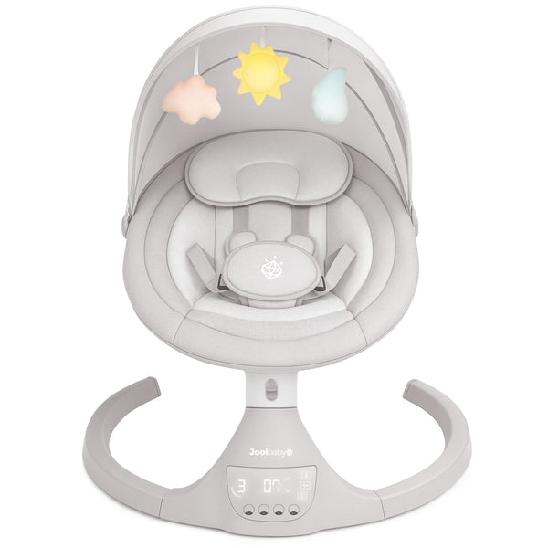 Jool Baby Nova Swing in action with side-to-side motion soothing a newborn.