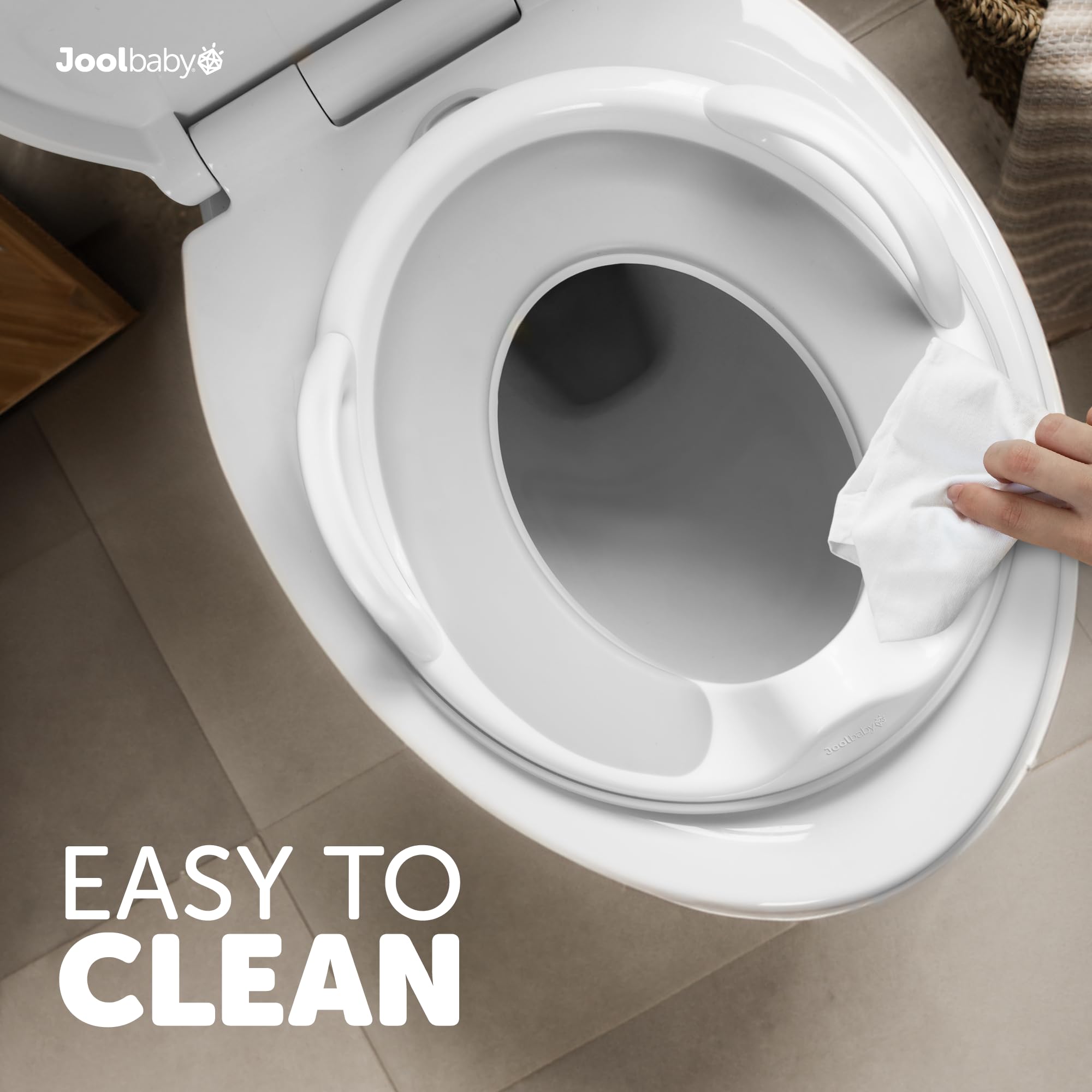 Jool Baby potty seat gray design complements bathroom decor and cleaning.