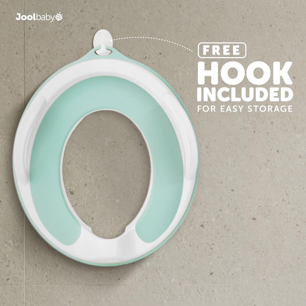 Jool Baby Potty Seat splash guard keeps messes contained during use.