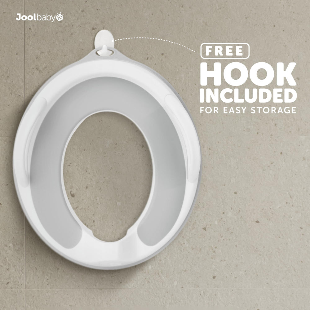 Jool Baby potty seat splash guard preventing spills during training.