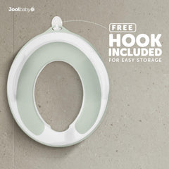 Jool Baby potty seat splash guard demonstrates mess containment during training.