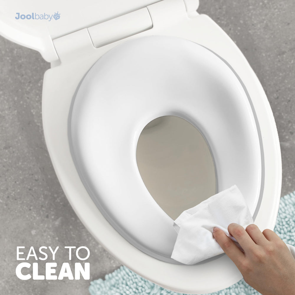 Jool Baby gray potty seat includes a storage hook for tidy storage.