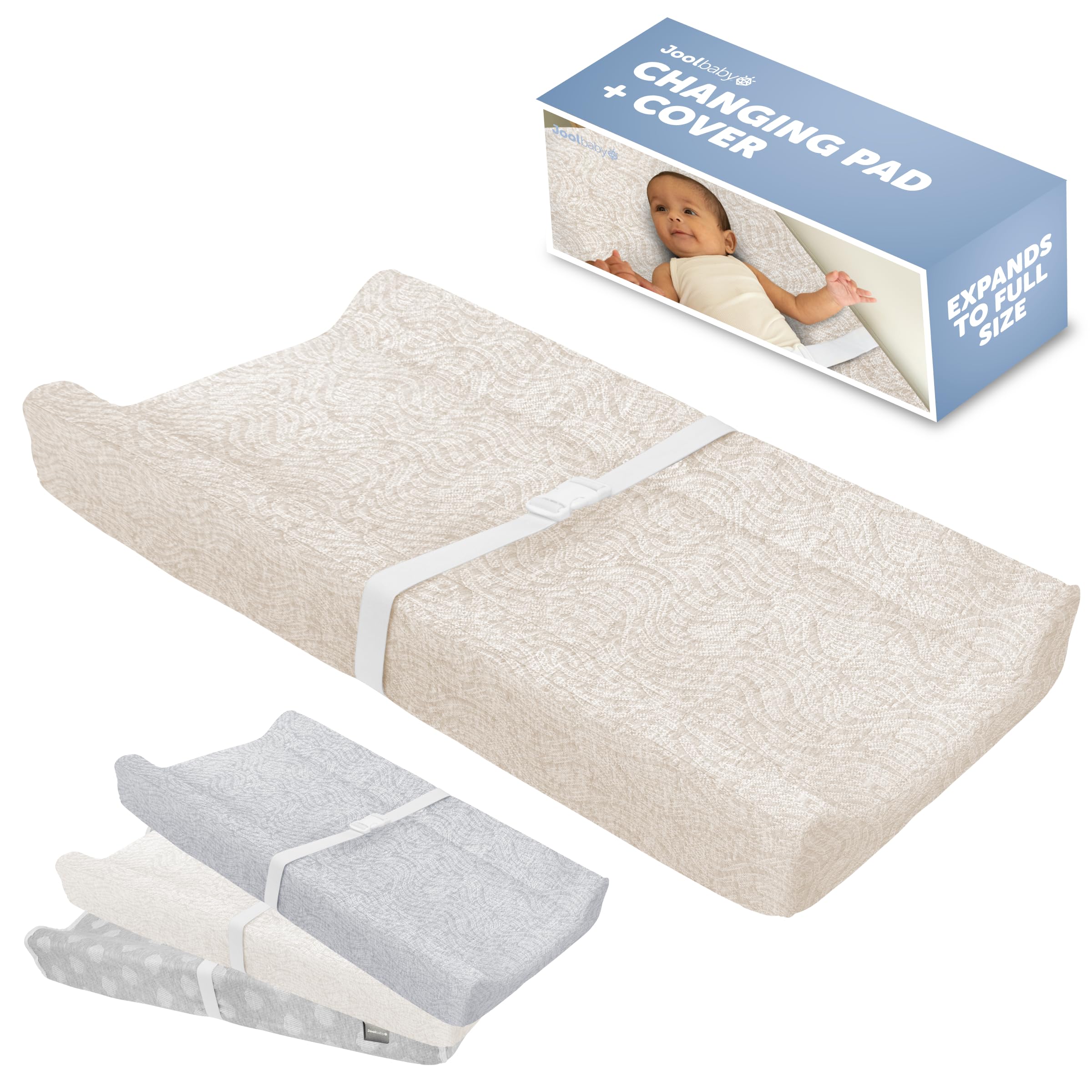 Jool Baby Serenity changing pad with wave pattern offers a soft, secure surface.