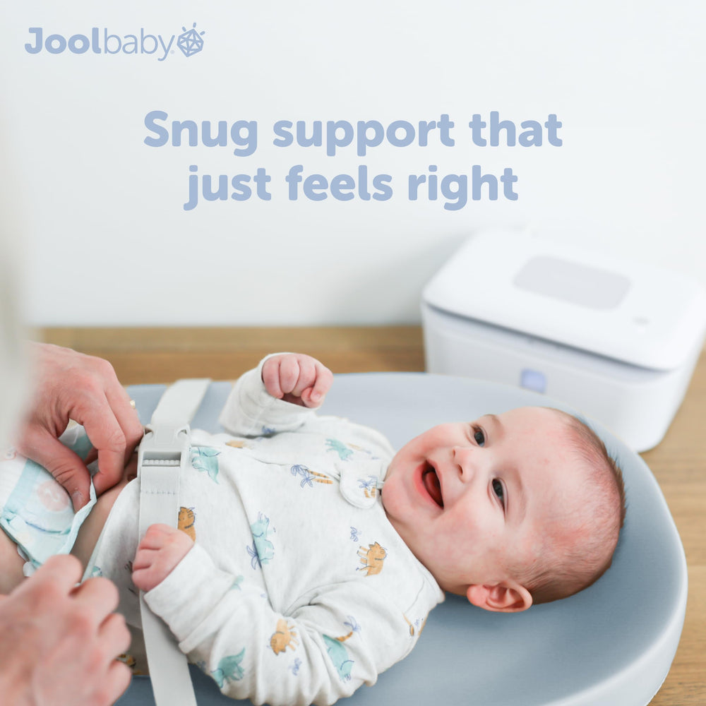 Jool Baby blue changing pad showing large dimensions for growing infants.