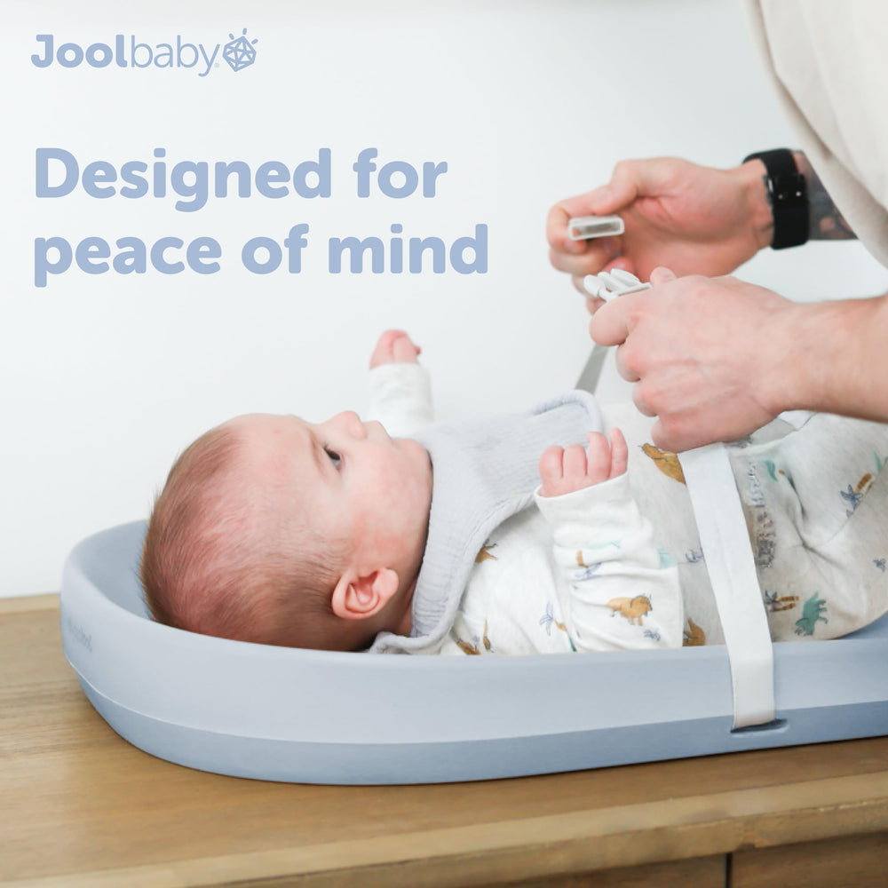 Jool Baby blue compact pad on a nursery shelf for decor compatibility.
