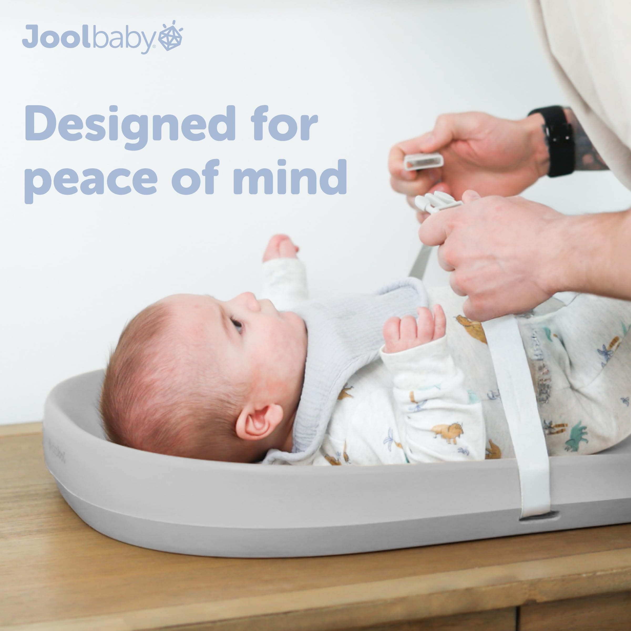 Jool Baby gray durable foam for comfortable diaper changes.