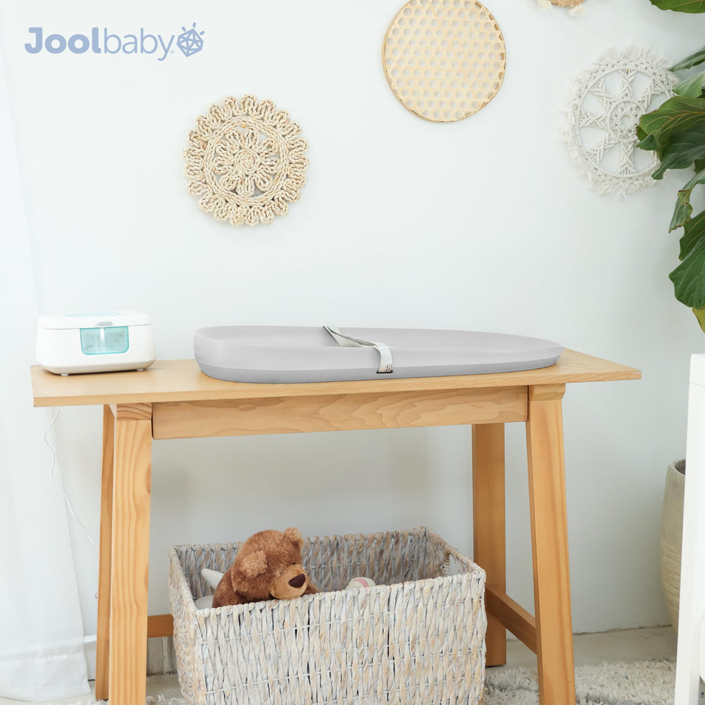 Jool Baby gray pad compact for travel and on-the-go changing.