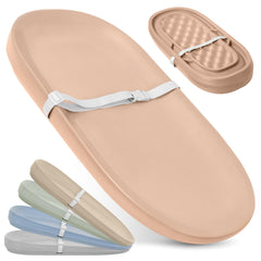 Jool Baby waterproof changing pad in peach, top view with easy wipe-clean surface.