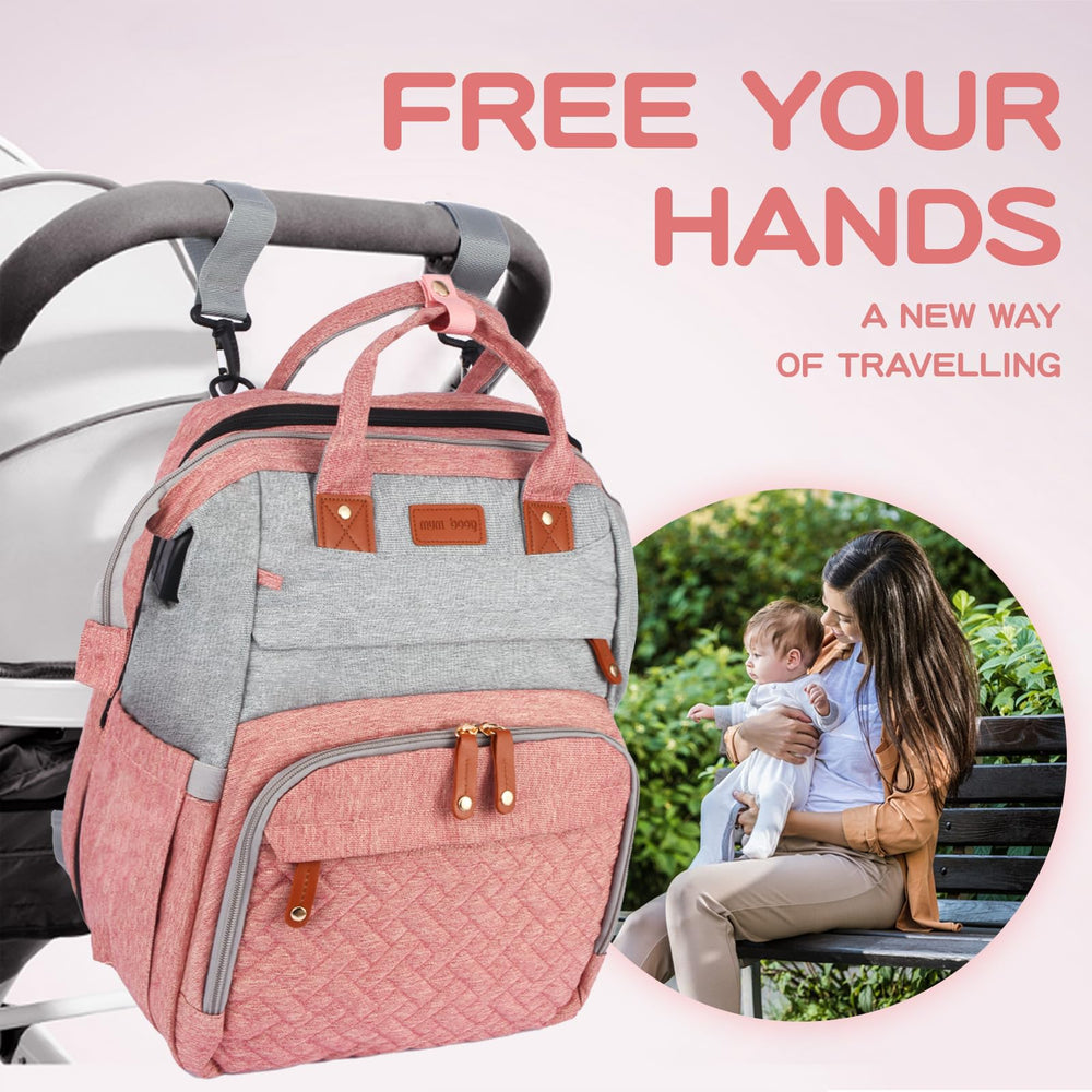 JOYCE diaper bag backpack with stroller buckle straps for quick stroller attachment.