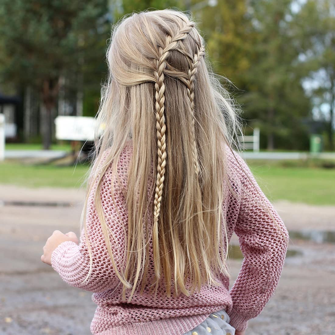 Joyeah baby hair ties in a tiny ponytail for easy styling.