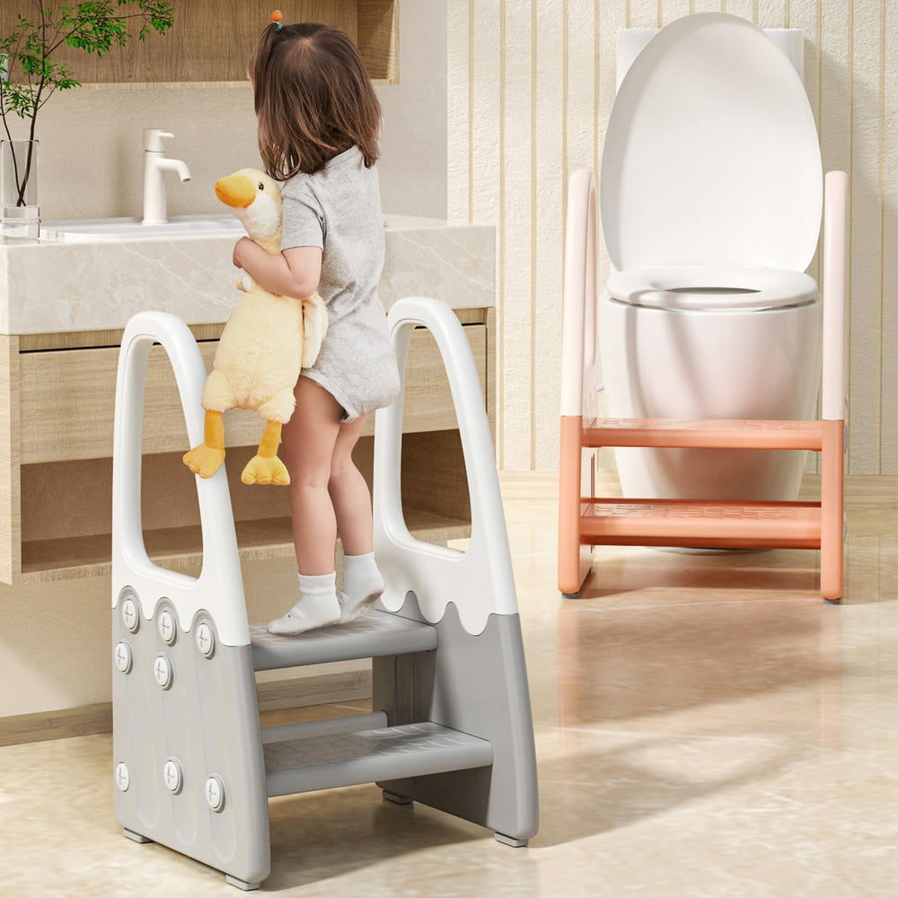 Joylico stool used for potty training beside sink