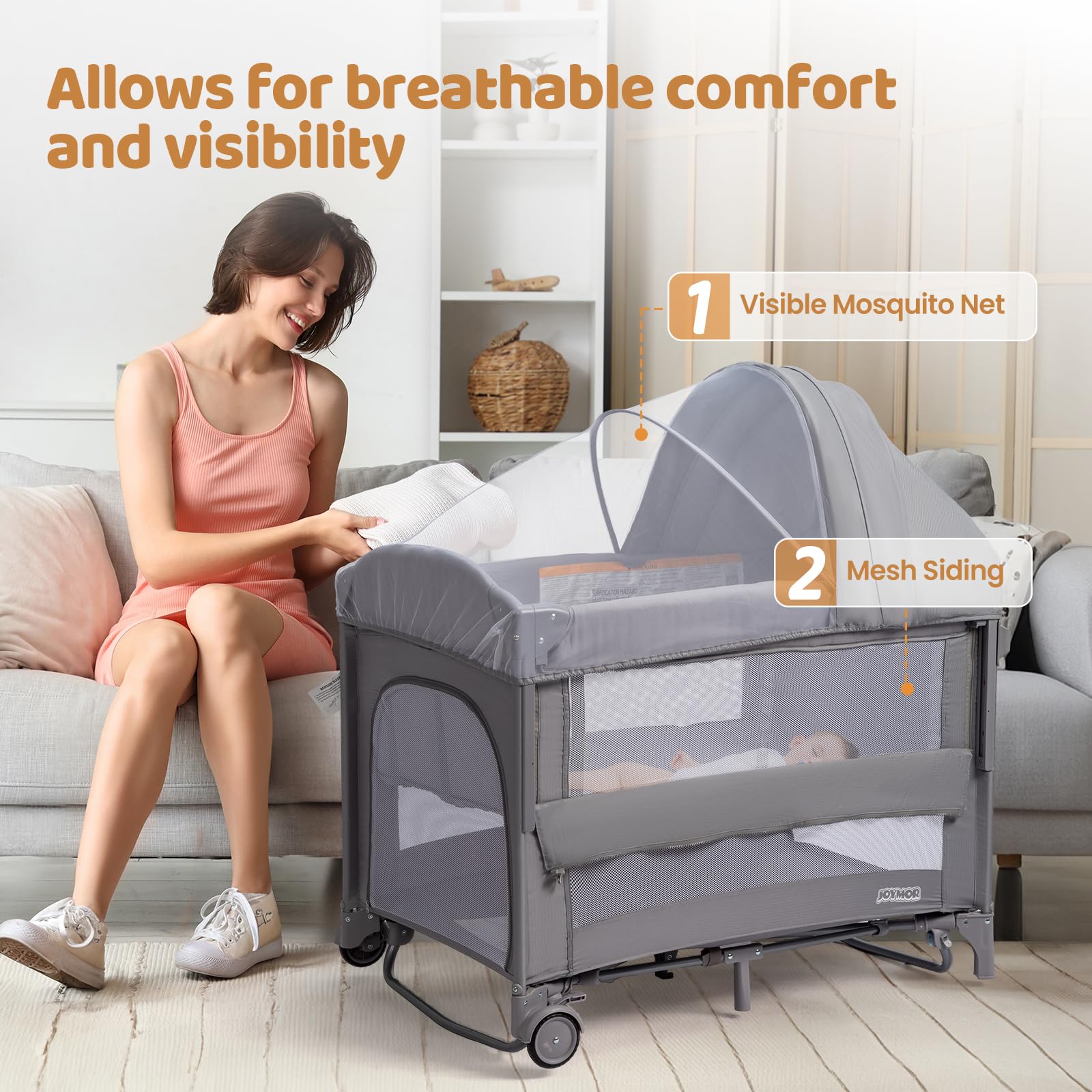 Joymor 9-in-1 bedside bassinet mosquito net for light blocking and insect protection.