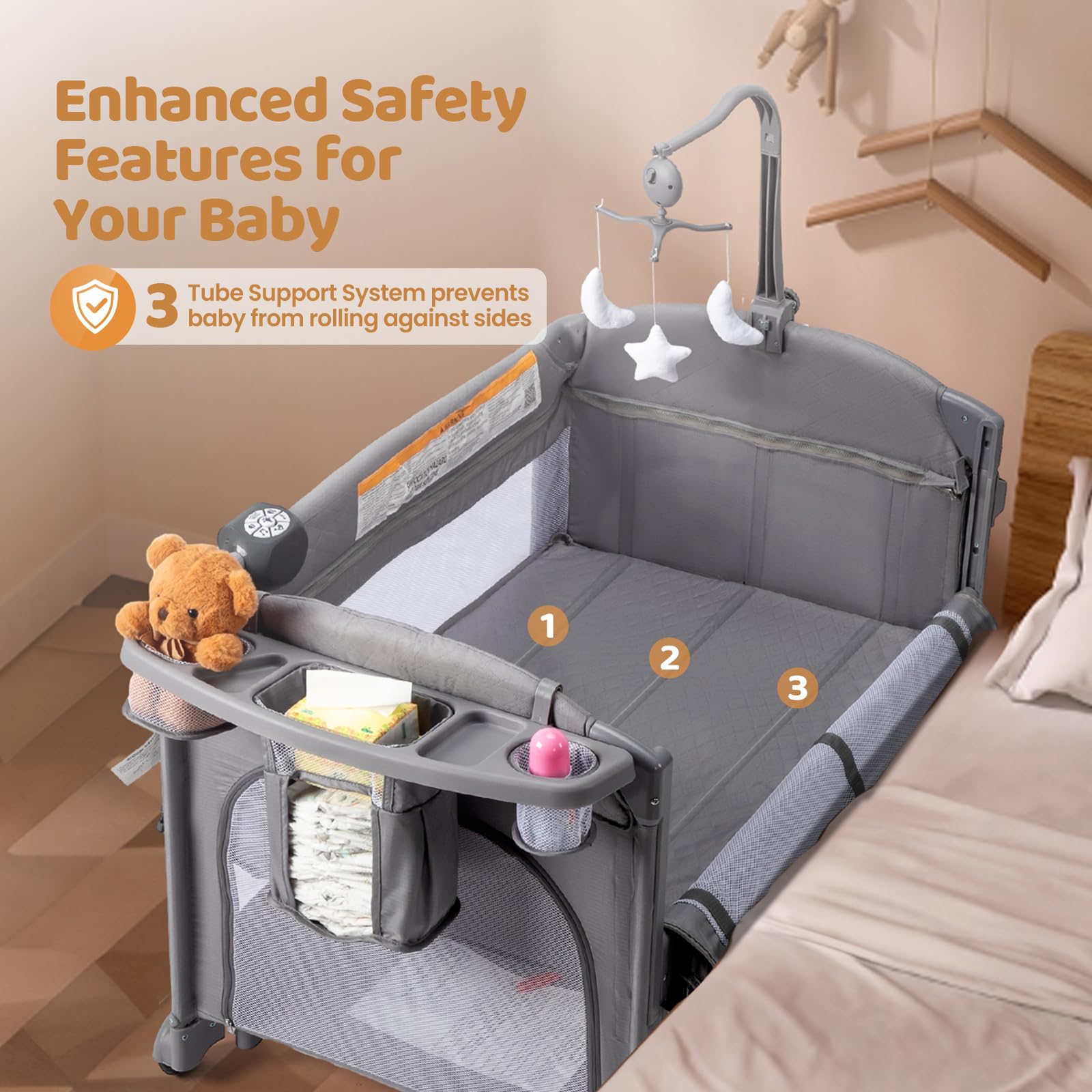 Joymor 9-in-1 bedside bassinet with Music Center for calming moments.