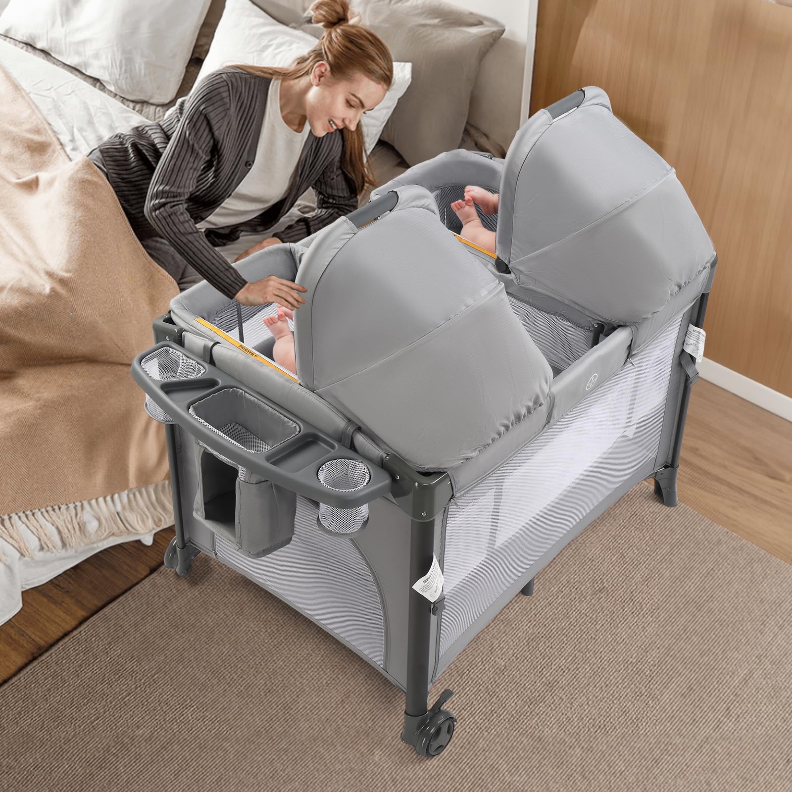 JOYMOR Twin Bassinet foldable side sleeper showing easy access and compact storage.