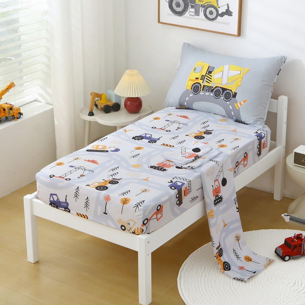 Front design of JQWUPUP bedding shows yellow construction vehicles on roads