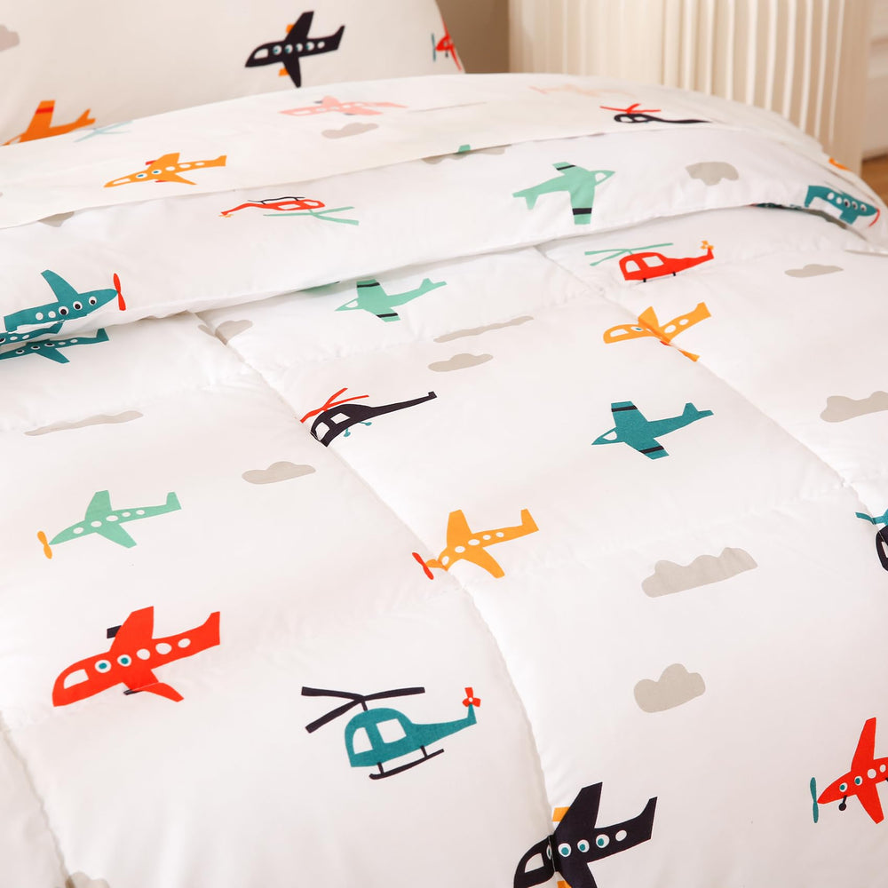 JSD Airplane Toddler Bedding Set dinosaur pattern adds playful bedtime fun.
