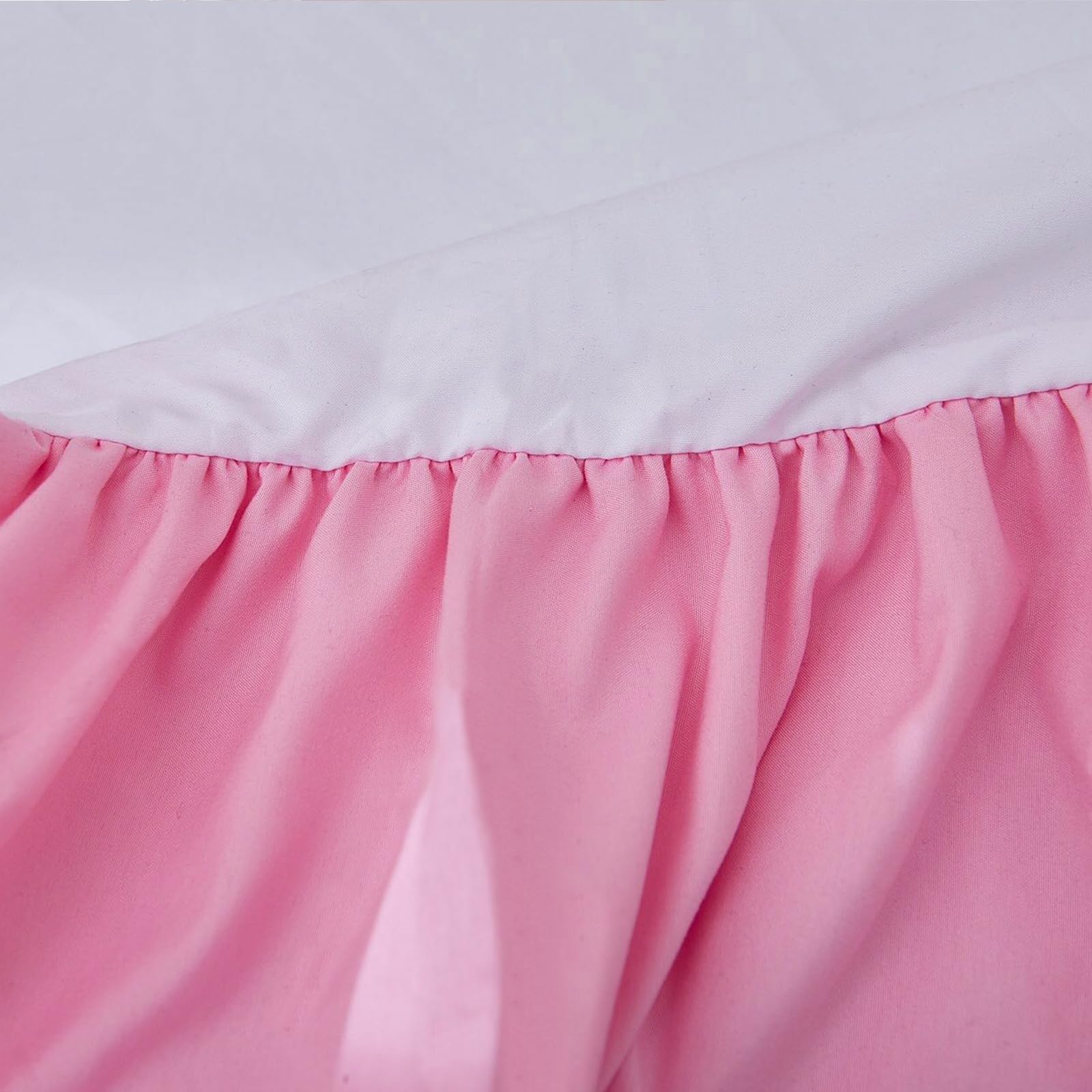 JSD pink crib skirt is machine washable for easy care.