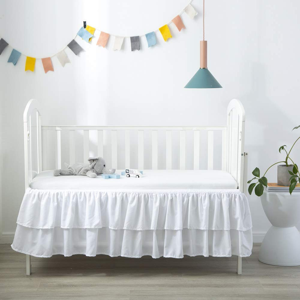 JSD deep drop skirt helps maintain a tidy floor area around the crib