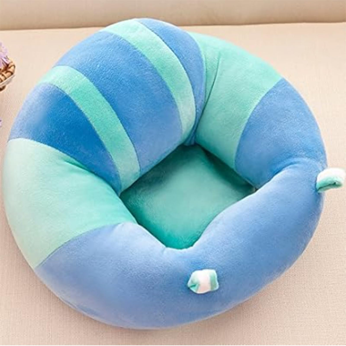 Juaugusep baby sit-up seat plush supports gentle back while learning to sit.
