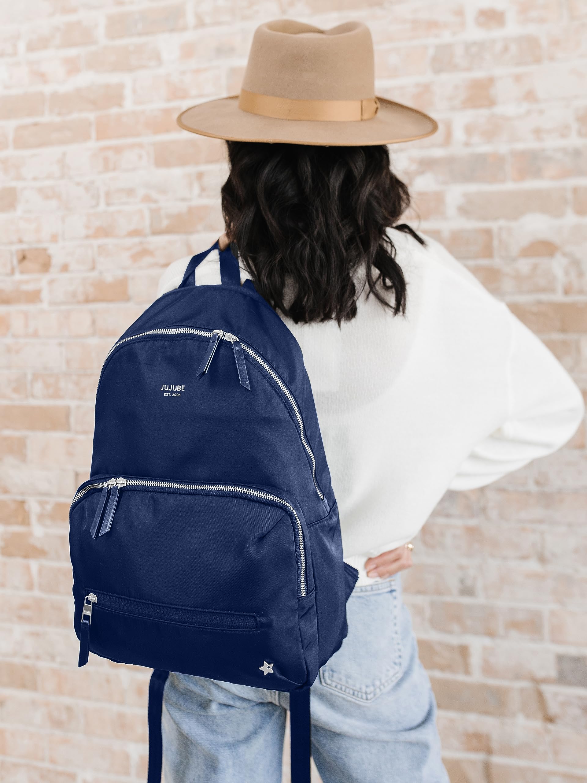 JuJuBe Navy color diaper backpack blends style with everyday practicality.