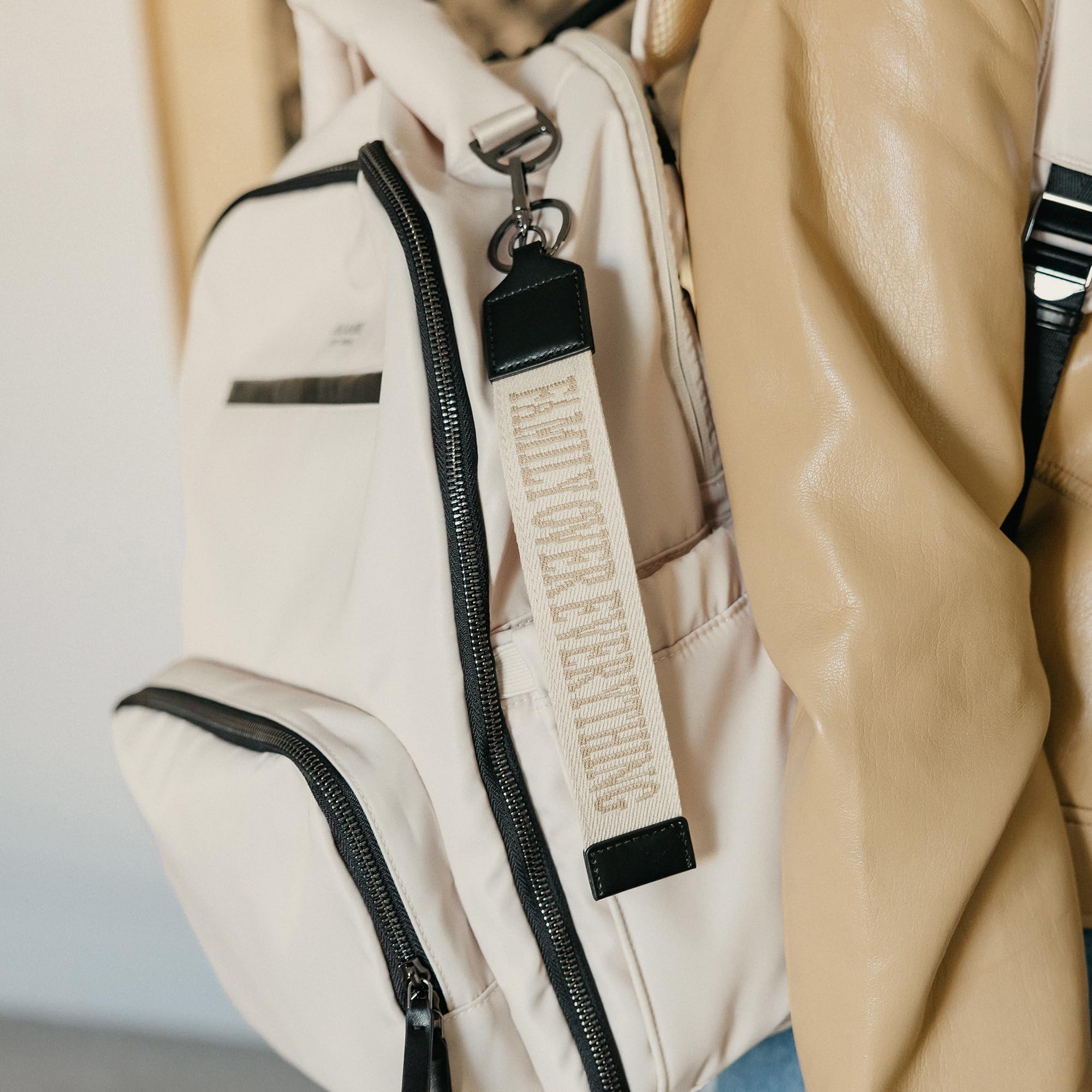 JuJuBe x Witney Carson storage pockets organize diapers, wipes, and essentials.