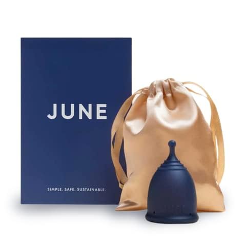 June Menstrual Cup in hand shows comfortable fit.
