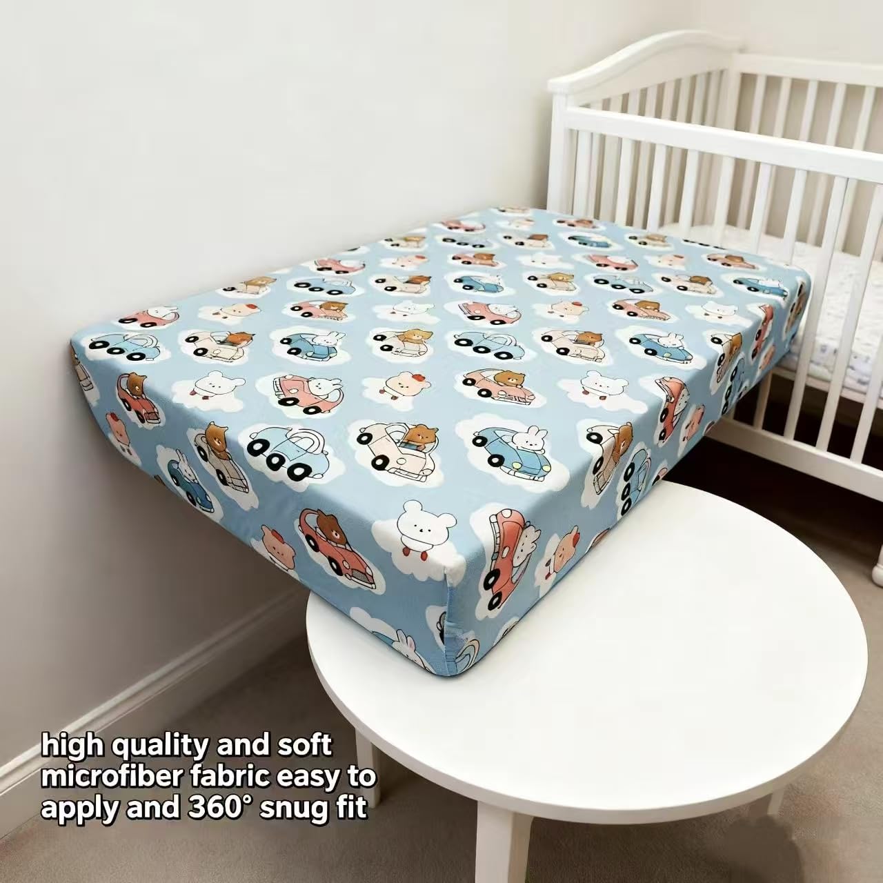 Junengchuang snug-fit elastic-bottom secures playards during awake time and sleep.
