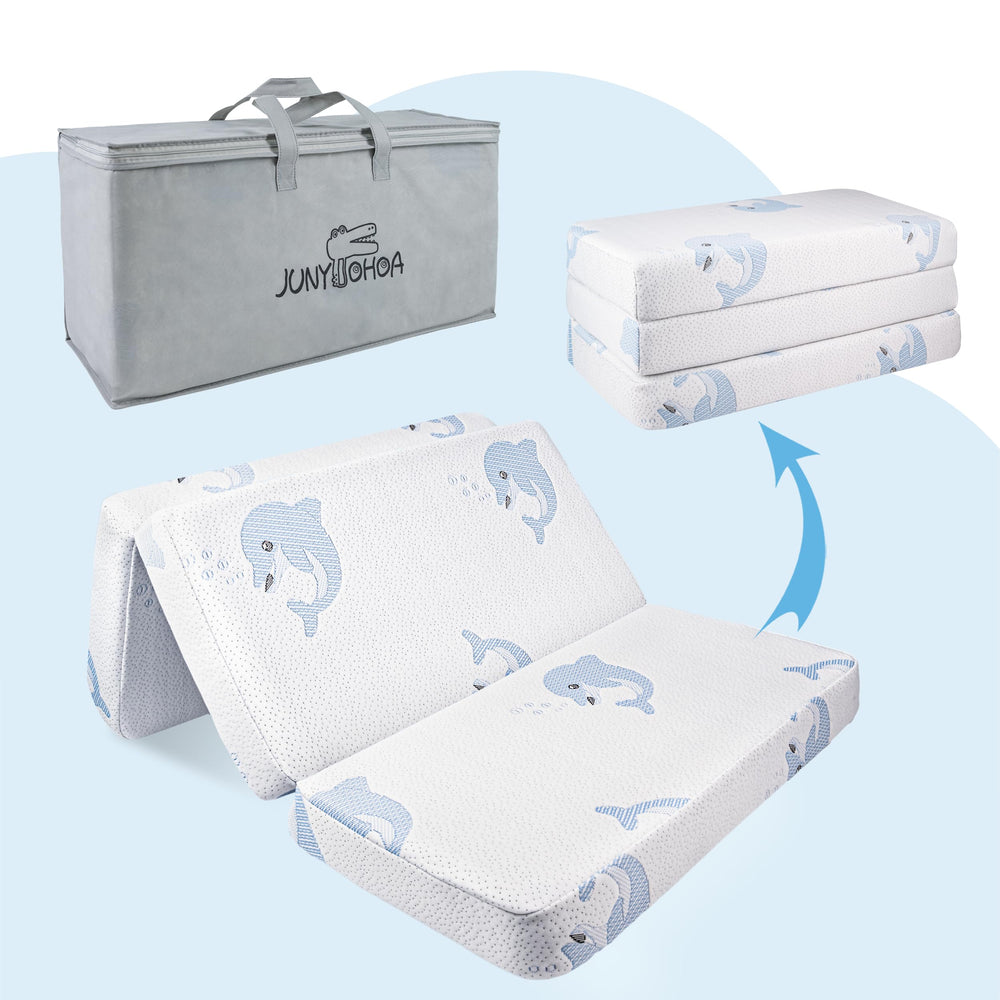JUNYOHOA Trifold Pack and Play Mattress white side supports infants for safe naps.