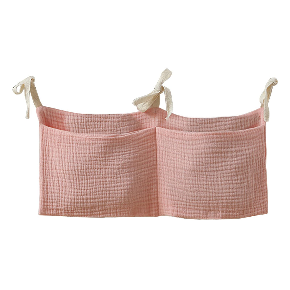 JUSTAUS bedside hanging bag with milk bottle pocket for quick nighttime feeding.