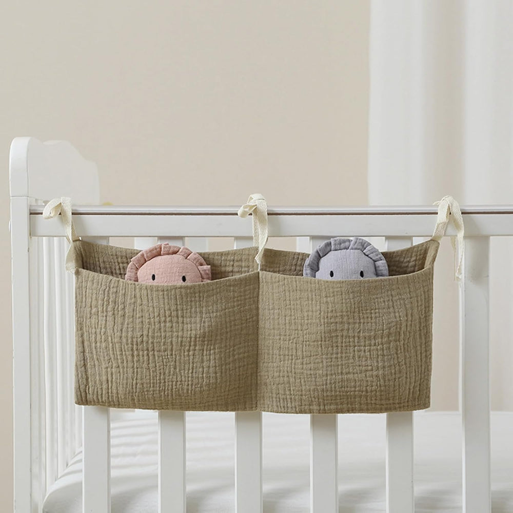JUSTAUS crib bedside storage pocket keeps bottles within reach