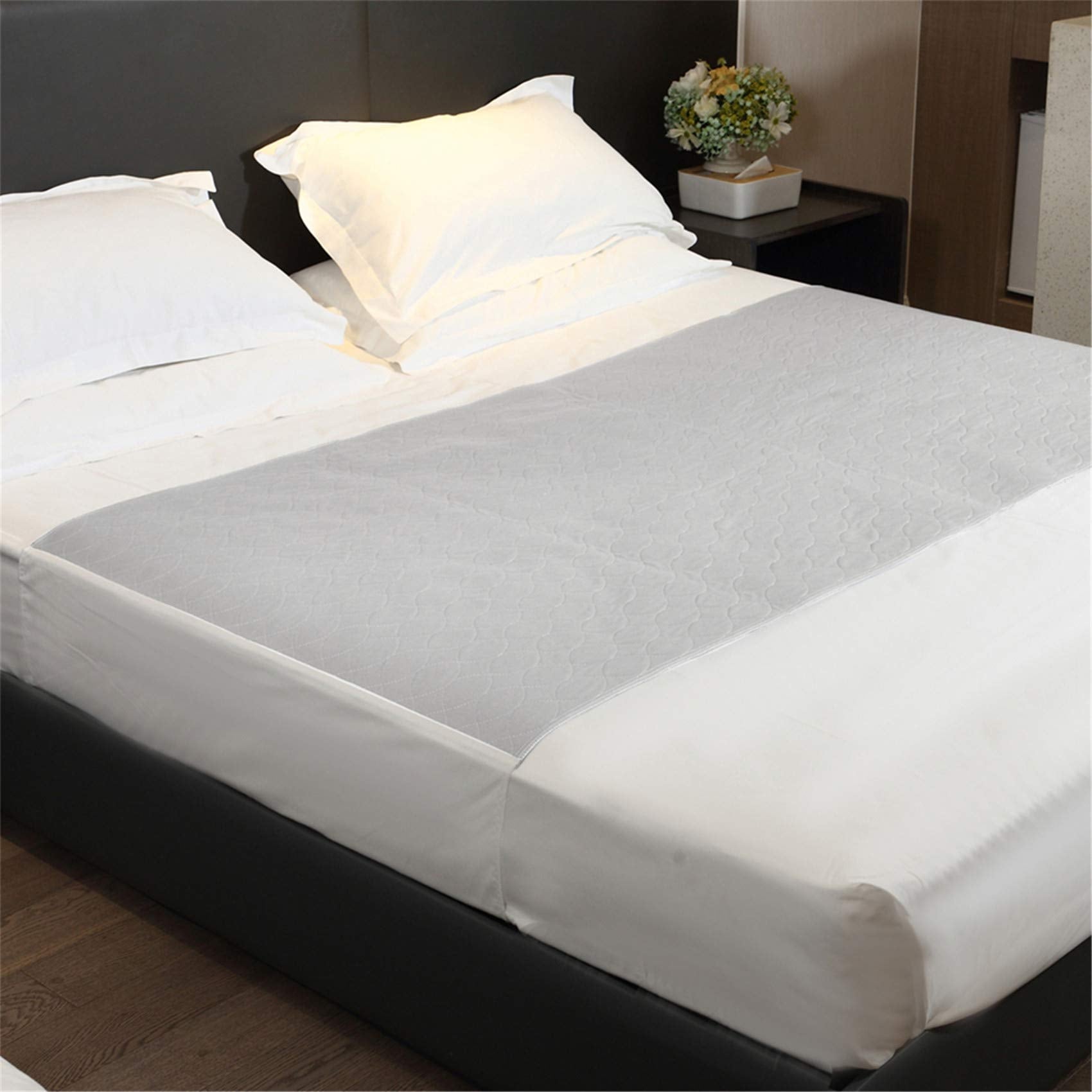 JUSSYOS reusable bed pad in grey with full coverage top view for bed protection
