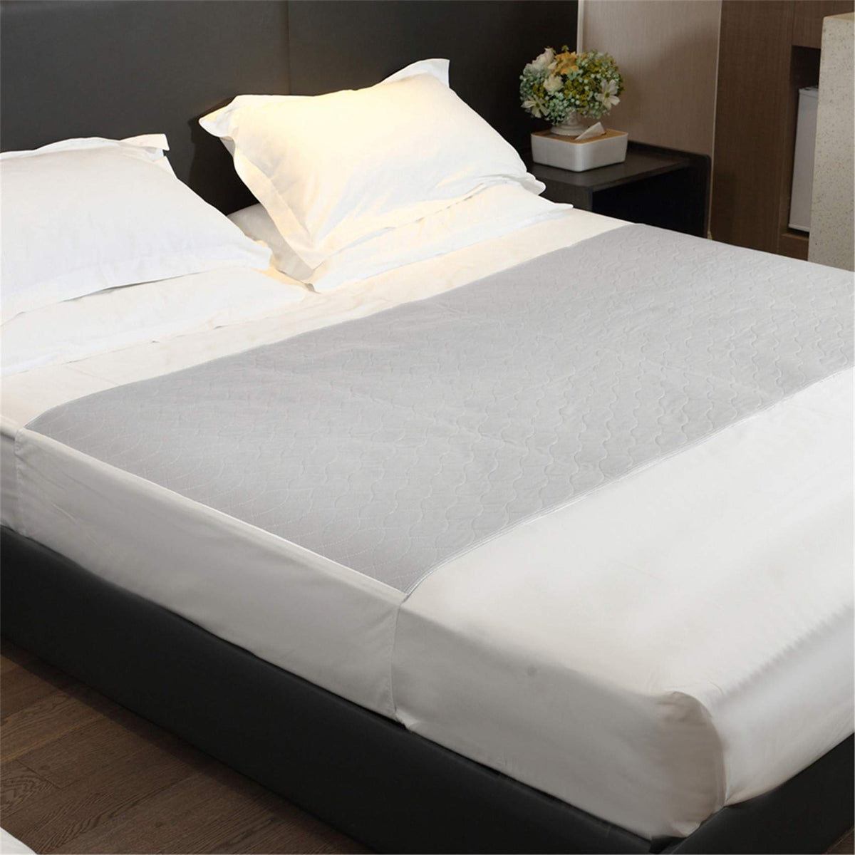 JUSSYOS reusable bed pad in grey with full coverage top view for bed protection