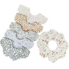 JUVA Petal Drool Bib with 360° rotation for comprehensive drool coverage