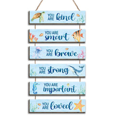 Kadiak ocean decor placards for kids' room brighten walls with positive quotes.