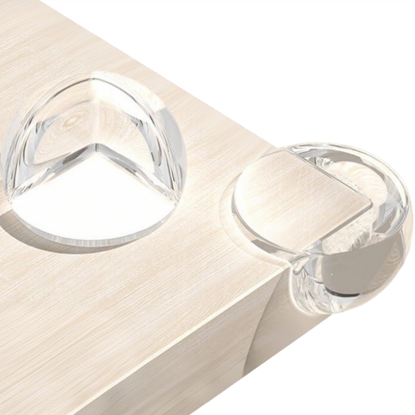 KAIYUER 18-pack clear corner guards on a glass table edge provide child safety.
