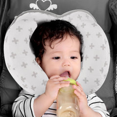 KAKIBLIN Baby Neck Pillow banana side view highlights removable banana shapes.