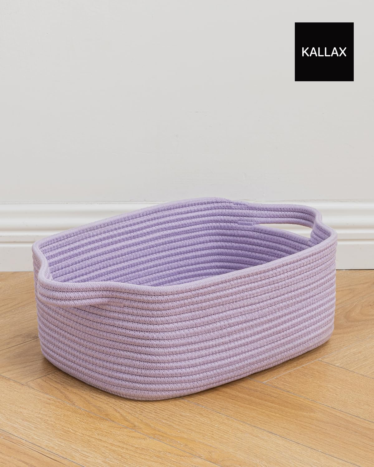 KALLAX nursery storage basket keeps diapers and small items tidy.