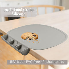 Kalovin placemat on table with spill catcher demonstrating mess control