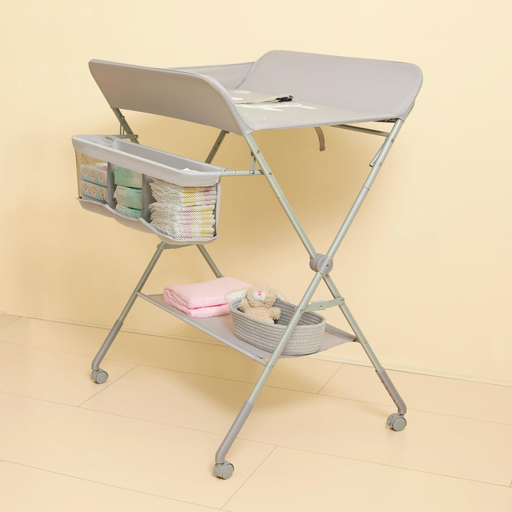 KARAOK baby changing table with wheels shows four-level height adjustment for comfortable changes.